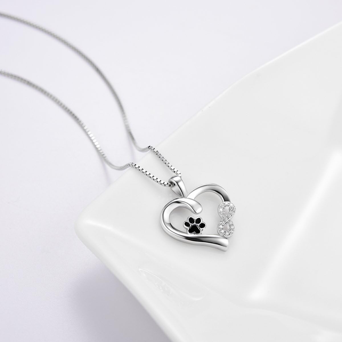 Althea - Necklace with paw, heart & infinity symbol