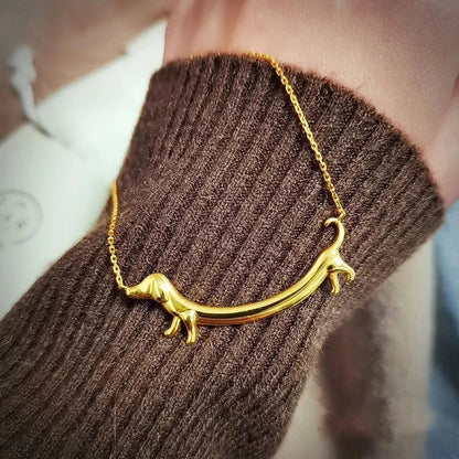 Shaneta  - Dachshund necklace in silver and gold