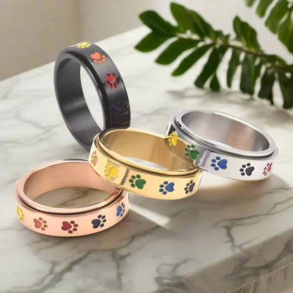 Thea - Rotatable anti-stress ring with rainbow paws